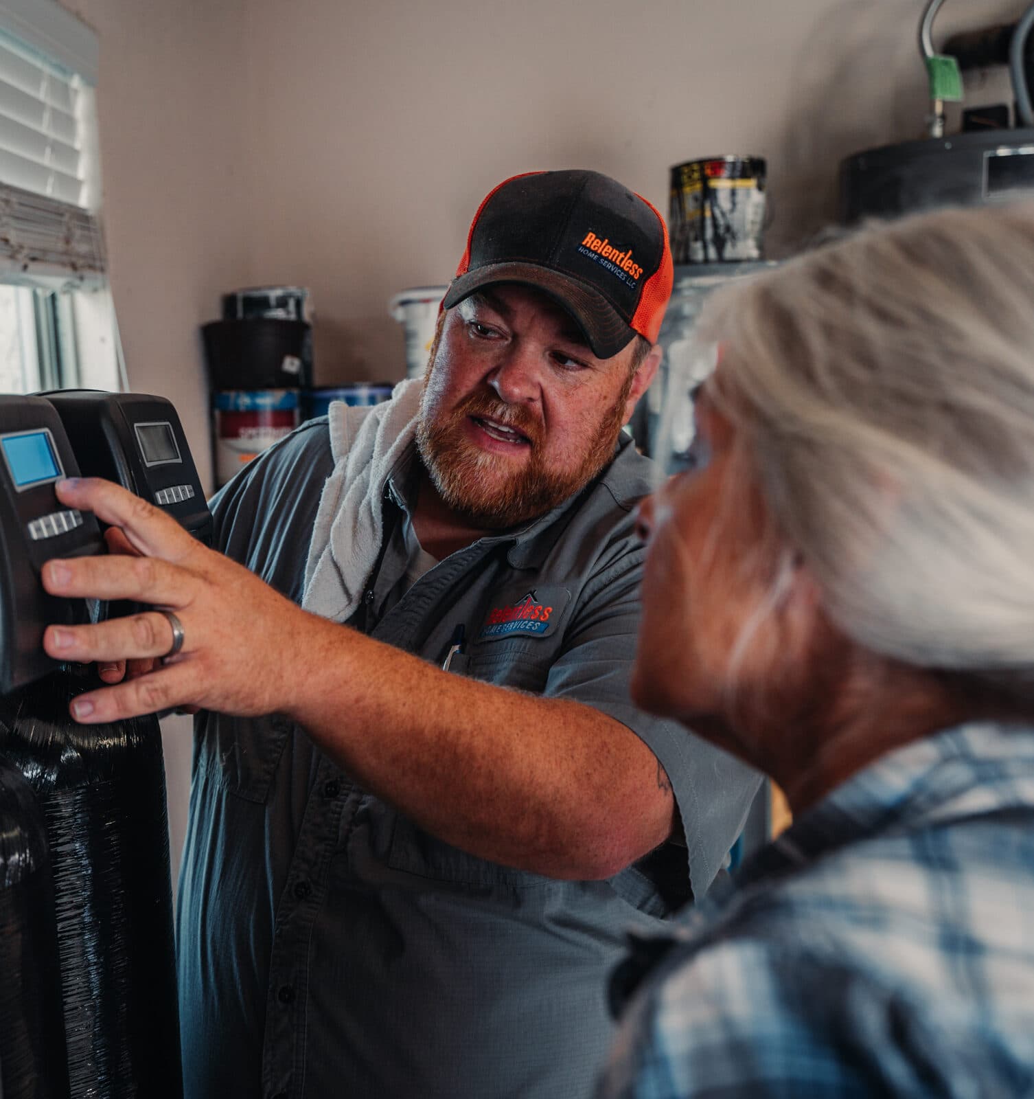Relentless Plumbing Solutions technician performing plumbing maintenance